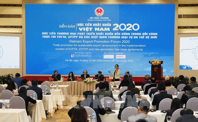 论坛场景。图自越通社 2020年全年越南商品出口总额或达2670亿美元 ảnh 2