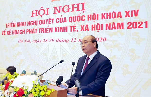 越南政府总理阮春福在会议上发表讲话。图自越通社 政府总理阮春福:越南在许多领域上完全可以走在前茅 ảnh 1