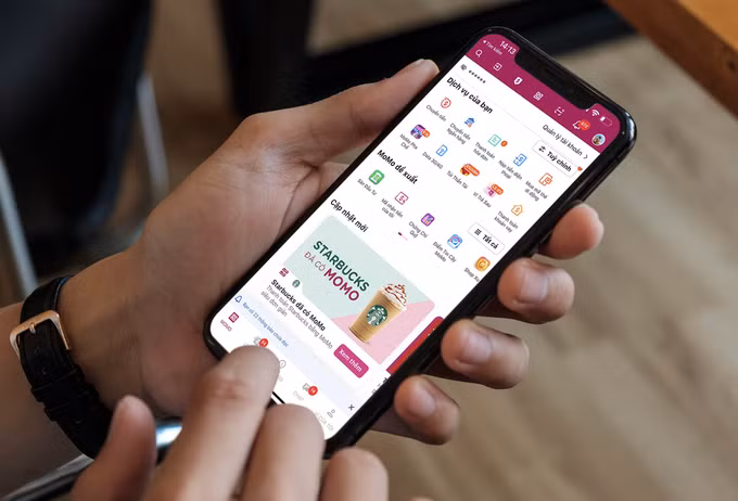 MoMo成为星巴克越南咖啡连锁店第一个集成支付的电子钱包 ảnh 2