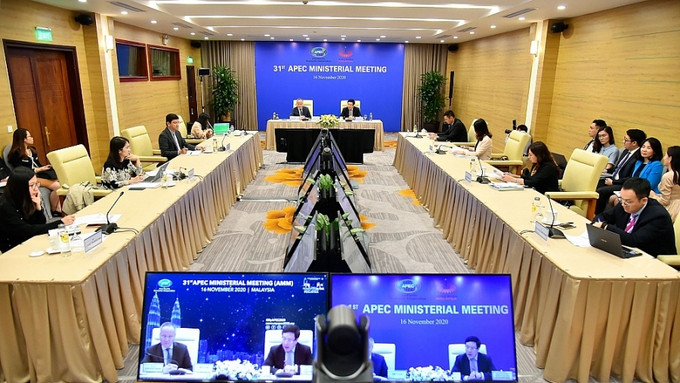 会议场景。图自越通社 政府副总理兼外交部长范平明出席亚太经合组织第31届部长级会议 ảnh 2