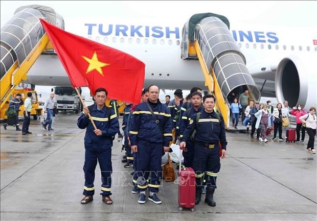 越南公安部土耳其地震灾区救援队出色完成任务回国。图自越通社 越南公安部土耳其地震灾区救援队出色完成任务回国 ảnh 1