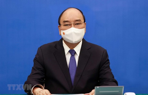 越南国家主席阮春福。图自越通社 越南国家主席阮春福与联合国秘书长古特雷斯通电话 ảnh 1