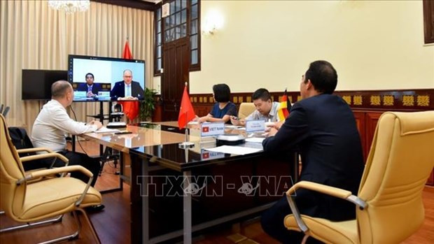 越南外交部副部长苏英勇在外交部总部同德国外交部国务部长尼尔斯·安恩(Niels Annen)举行视频会谈。图自越通社 进一步深化越南与德国在各领域的战略伙伴关系 ảnh 1