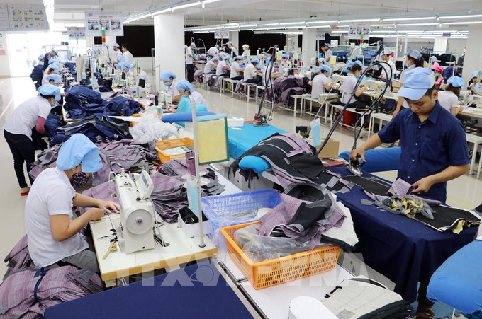 日本Matsuoka Corp.计划投资30亿日元在越南生产保护服。图自越通社 日本Matsuoka Corp.计划投资30亿日元在越南生产保护服 ảnh 1