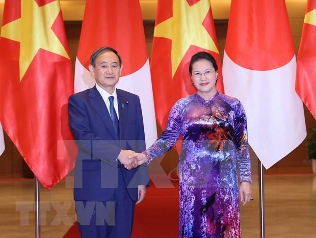 越南国会主席阮氏金银会见日本首相菅义伟 ảnh 1