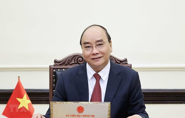 越南国家主席阮春福。图自越通社 越南国家主席阮春福就提高劳动技能发出呼吁信 ảnh 1