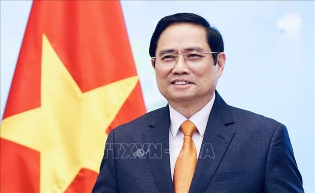 越南政府总理范明政。图自越通社 第四次湄公河委员会峰会:越南致力于湄公河流域的合作和可持续发展 ảnh 1