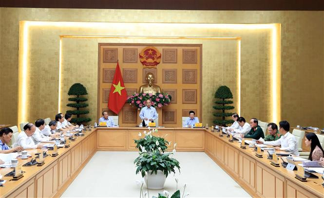 会议场景。图自越通社 阮春福总理主持工资制度改革会议 ảnh 2