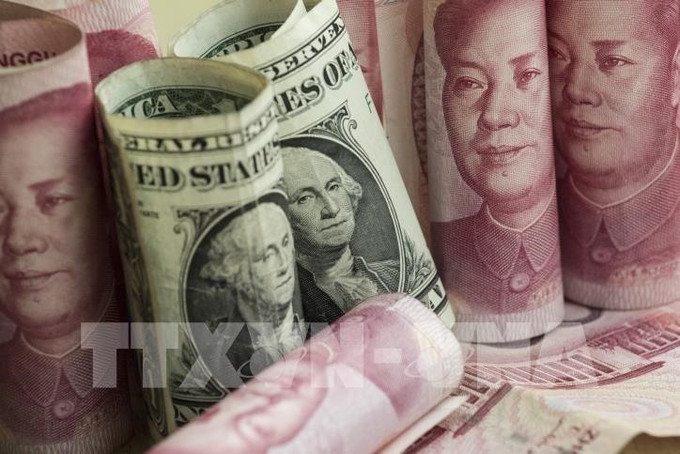 附图 。图自越通社 5月20日越盾对美元汇率中间价下调10越盾 ảnh 1