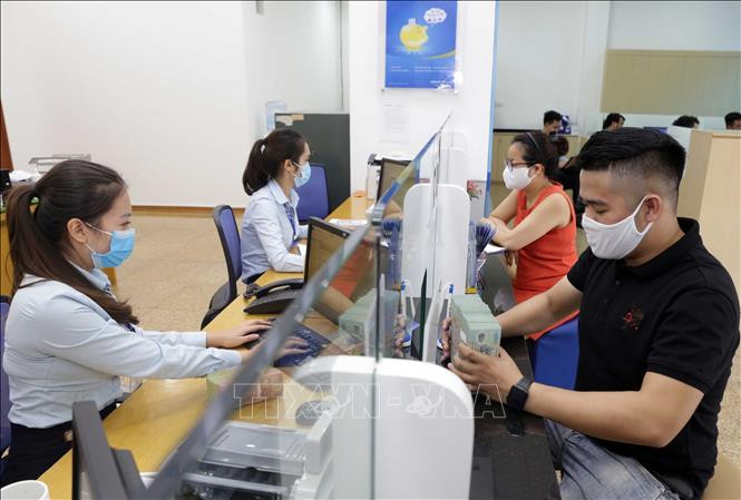 附图。图自越通社 越南国家银行决定调整利率 ảnh 2