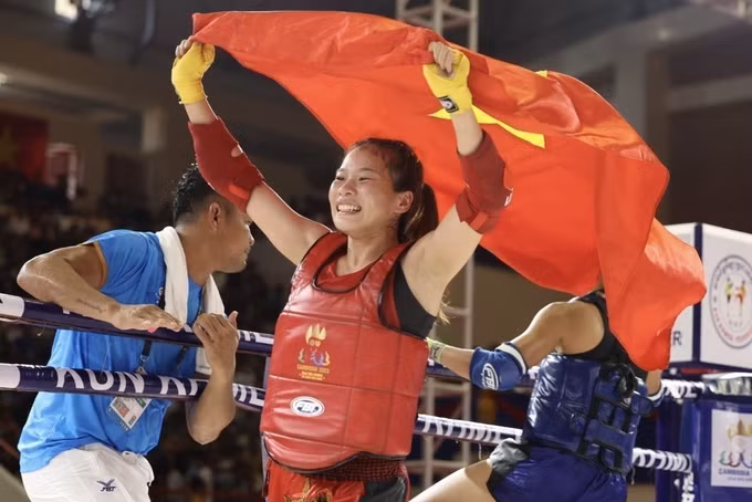 瑶族女性运动员为祖国夺金 ảnh 1