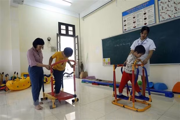 4.18越南残疾人日：提高残疾儿童协助政策的实施效率 ảnh 2
