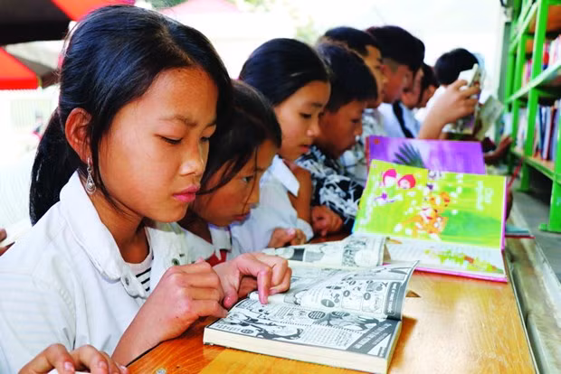 “流动图书车”模式在边境地区开展阅读推广活动 ảnh 2