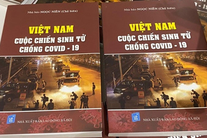 《越南—打击新冠肺炎疫情生死之战》一书重新出版。图自互联网 《越南—打击新冠肺炎疫情生死之战》一书重新出版 ảnh 1