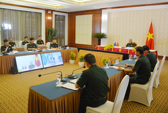 视频会谈全景。图自越通社 继续深化越南与欧盟的防务合作关系 ảnh 2