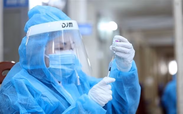越南政府总理范明政就新冠疫苗接种和推进疫情防控工作作出重要指示 ảnh 1