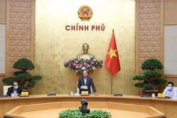 阮春福总理：上下一心、团结一致使疫情防控工作得以更快速、更高效进展