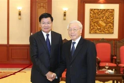 越共中央总书记阮富仲会见老挝政府总理通伦•西苏里