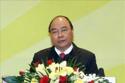 阮春福：银行在考虑经营效益的同时要承担起帮助人民的责任 