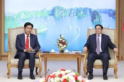 政府总理范明政会见老挝司法部部长帕维·西布阿利法