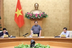 越南政府总理范明政主持政府2022年11月立法工作会议