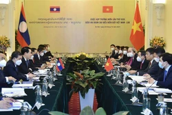 越老同意继续配合做好两国边境线和国界界碑的管理工作