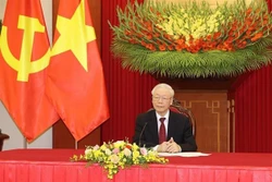 越共中央总书记阮富仲与德国社会民族党领导人、总理舒尔茨通电话