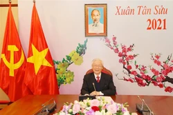 越共中央总书记、国家主席阮富仲与老挝人民革命党中央总书记通伦·西苏里通电话