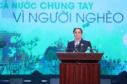 政府总理范明政：以实际行动携手扶贫
