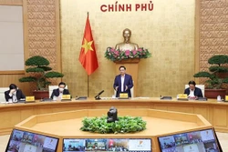 政府总理范明政：力争到今年底完成18岁以上人群全程疫苗接种工作