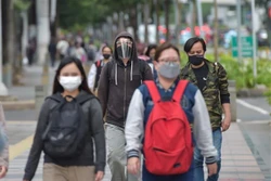 印尼加大新冠肺炎疫情防控力度 老挝呼吁家长带孩子去接种疫苗