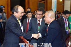 阮春福总理：侨胞们同政府和全民一道努力 建设日益繁荣发展的国家