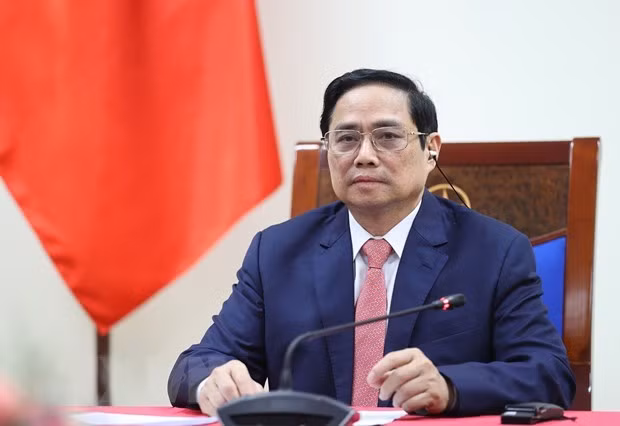 政府总理范明政与荷兰首相马克通电话