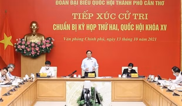 越南政府总理范明政接待芹苴市选民 ảnh 1
