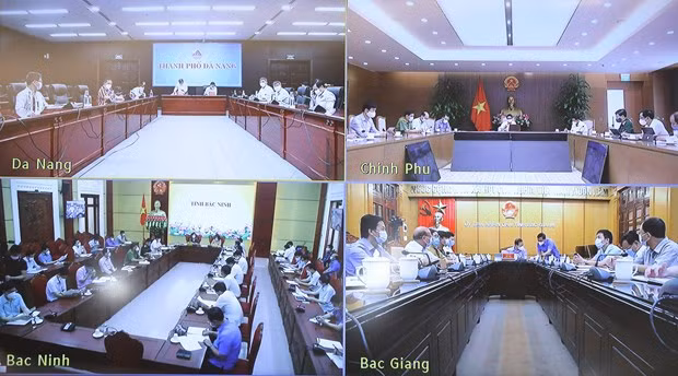 政府副总理武德儋：决不让疫情在各工业区扩散蔓延 ảnh 3