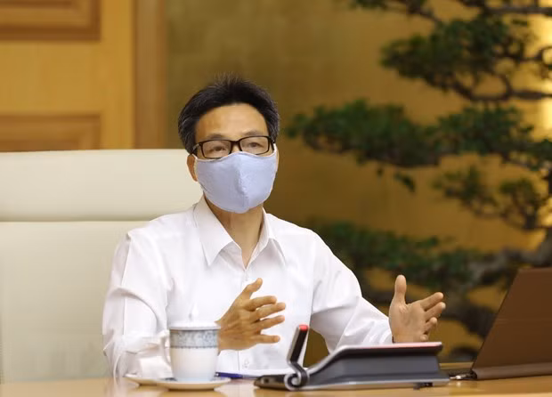 新冠肺炎疫情：坚决做好监测、追踪、隔离和治疗工作 ảnh 1