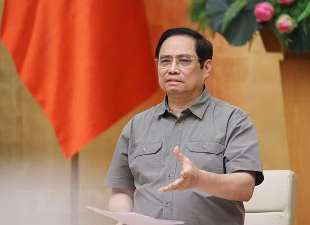 范明政总理：疫情防控不可掉以轻心 急于开放经营活动 ảnh 1