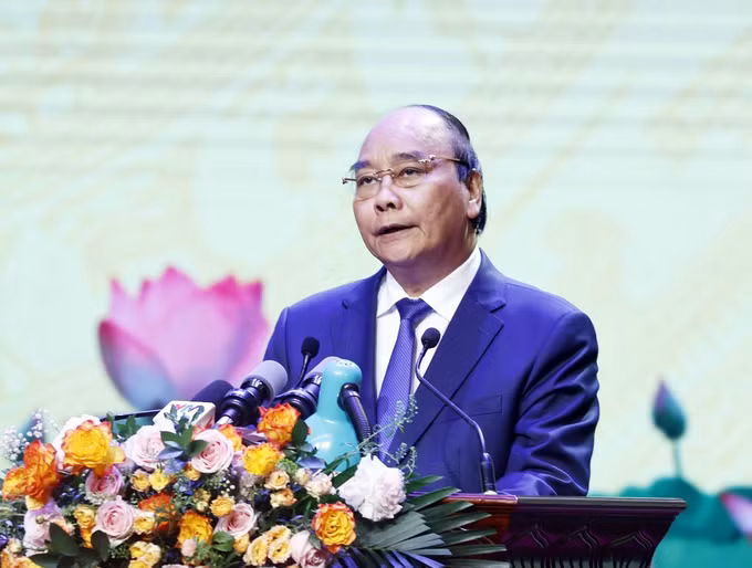 荣军烈士节75周年纪念典礼暨2022年全国先进革命有功者代表表彰大会在河内举行 ảnh 2