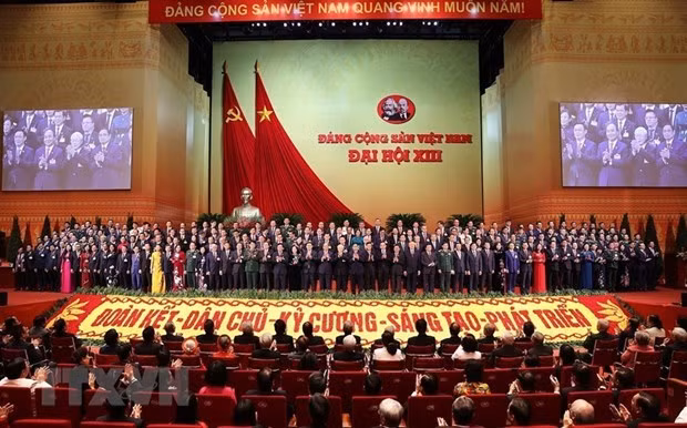 越共十三大闭幕会的新闻公报 ảnh 1