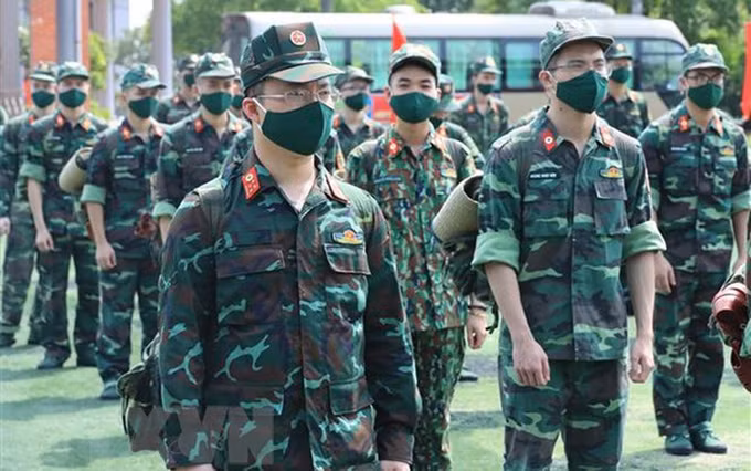 胡志明市和南方各省9月30日之后放宽社交距离措施 军队仍将继续助力做好疫情防控工作 ảnh 2