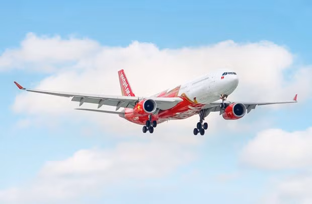 越捷航空为越南至日本航线乘客免费提供 30 公斤行李托运 ảnh 1