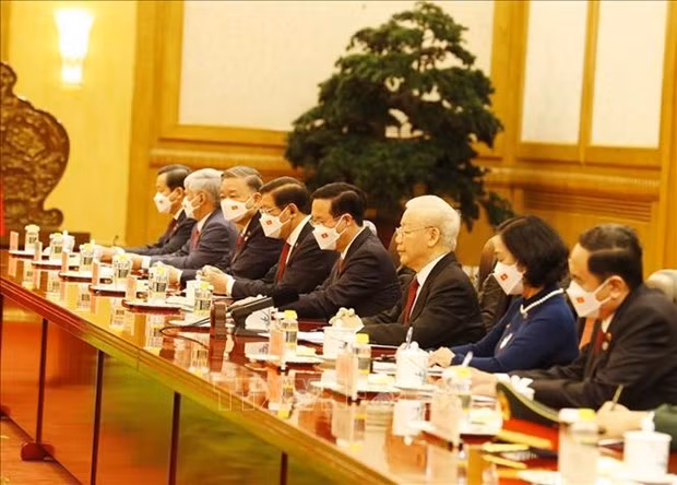 越共中央总书记阮富仲与中共中央总书记、中华人民共和国主席习近平举行会谈 ảnh 2