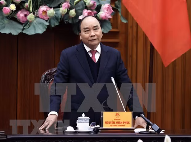 越南政府总理阮春福： 应采取强有力的措施和合适的方式推进国内新冠疫苗试验进程 ảnh 1