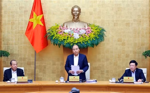 越南政府总理阮春福主持召开政府12月份例行会议 ảnh 2