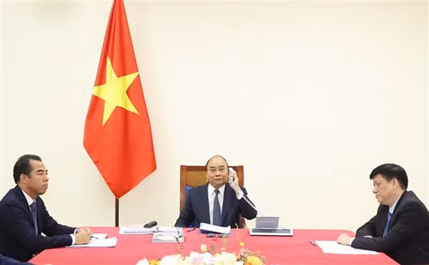 越南政府总理阮春福与德国总理安格拉·默克尔通电话 ảnh 1