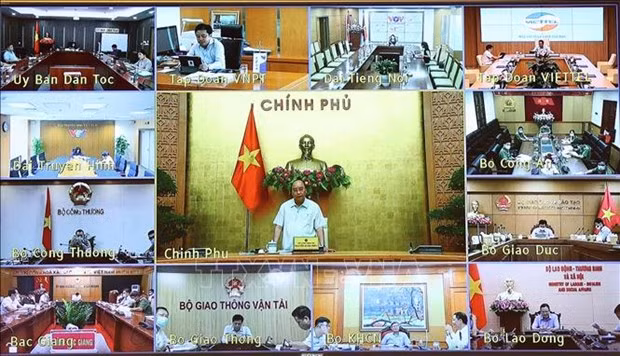 政府总理阮春福：加快对外国专家和投资者签证签发工作 ảnh 1