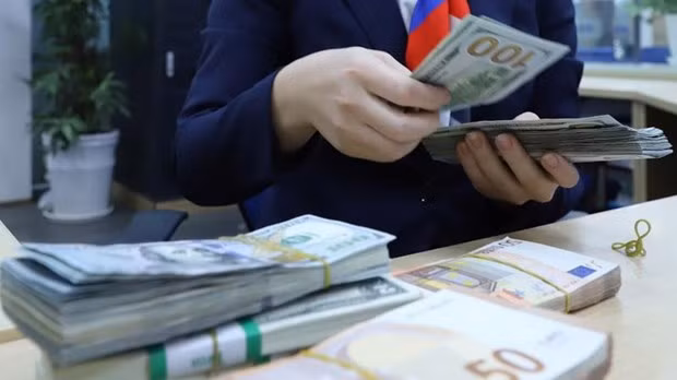6月3日上午越盾对美元汇率中间价下调3越盾 ảnh 1
