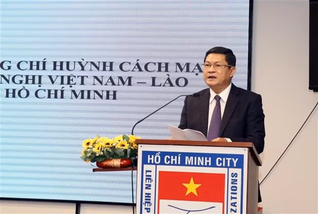 纪念老挝国庆45周年见面会在胡志明市举行 ảnh 2