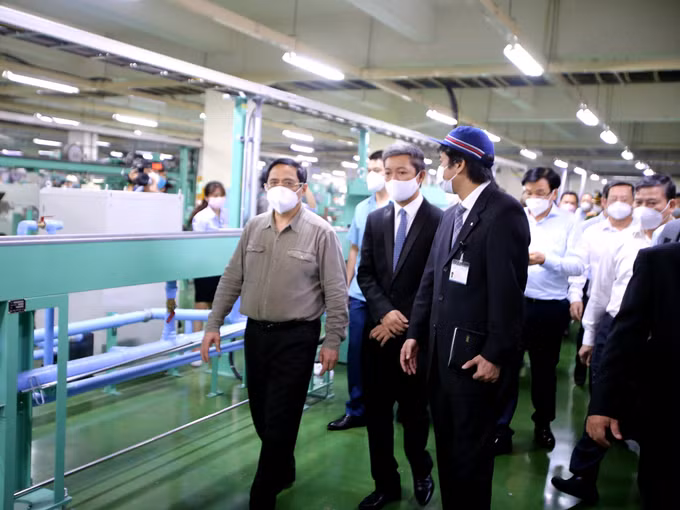 越南政府总理范明政赴胡志明市视察疫情防控工作 ảnh 2
