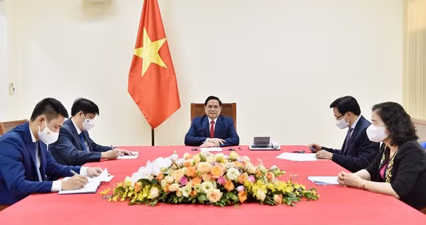 越南政府总理范明政建议世卫组织援助越南成为疫苗生产中心 ảnh 1